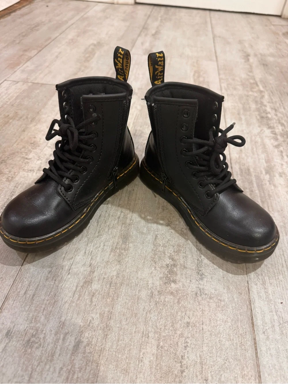 Dr. Martens Black Leather Kids Lace-Up Boots with Yellow Stitching
